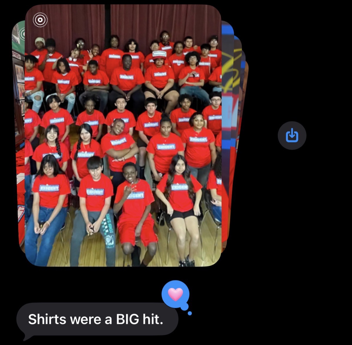 Customer text with a photo of a school group wearing their red custom shirts: Shirts were a BIG hit.